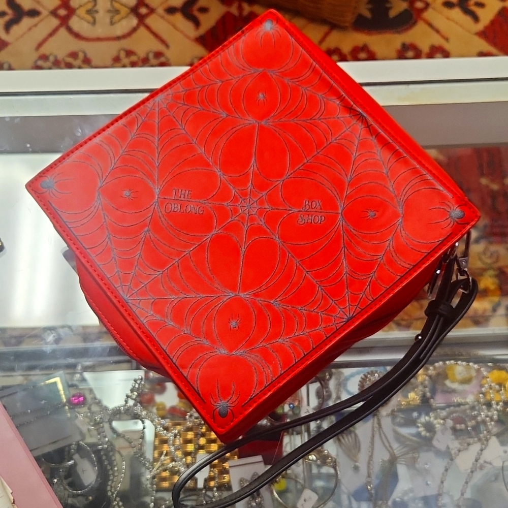 The oblong box shop spider wristlet